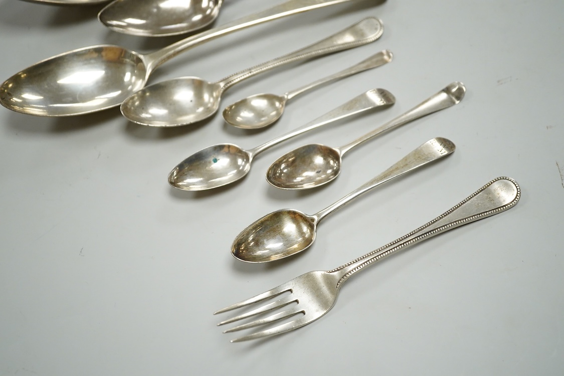 A pair of George III Old English pattern table spoons by Sumner & Crossley, London, 1778, 21.6cm, together with ten other items of Georgian and later silver flatware, including table spoons, teaspoons and a fork, various